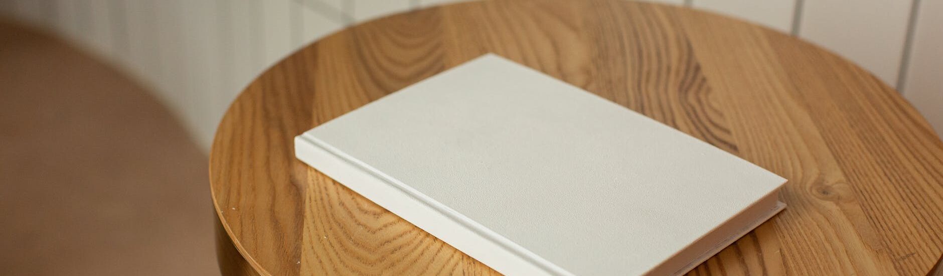 wooden table with blank white mockup