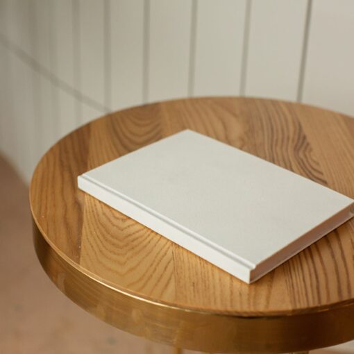 wooden table with blank white mockup
